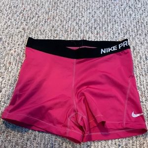 HOT PINK nike pros size large